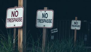 Read more about the article Dumpster Diving Trespassing Signs: Legal Weight and Enforcement